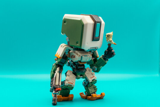 Bastion from Overwatch 2 on a teal background 