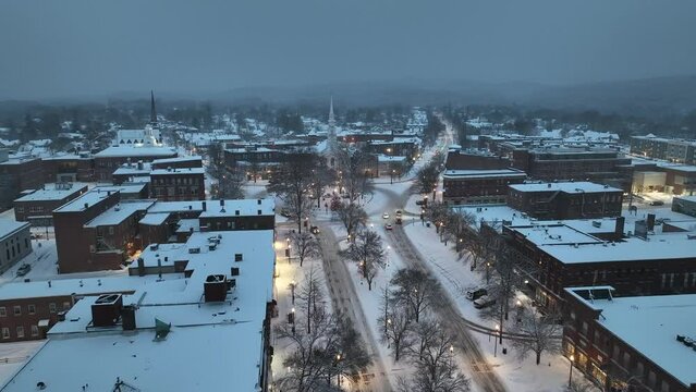 Keene, NH after snowstorm at dusk aerial drone footage