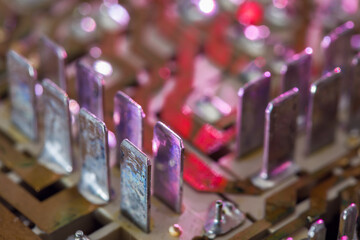Selective focus and shallow depth of field. Electronic board with contacts.