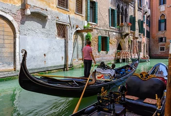 Foto auf Leinwand Narrow canal with gondola in Venice, Italy. Architecture and landmark of Venice. Cozy cityscape of Venice. © Ekaterina Belova