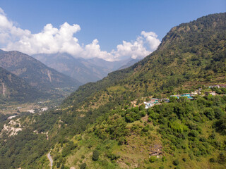 Fototapeta premium Aerial landscape of curvy road in the mountains