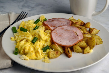 scramble eggs ith canadian  bacon and  home fries