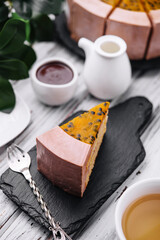 slice of chocolate cake with passion fruit