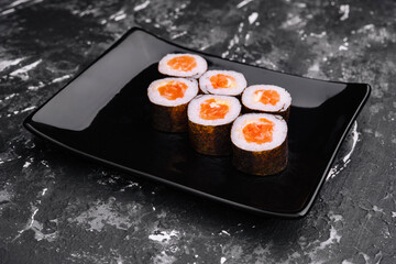 Salmon Maki Sushi on Black Stone Plate