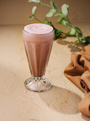 Hot coffee with milk in glass cup