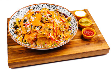 Mexican nachos with salsa and guacamole
