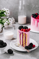 Fruit cake with fresh raspberry, blackberry and vanilla cream