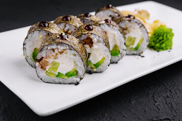 sushi maki with eel and avocado