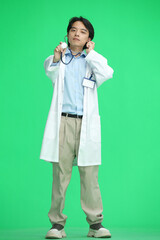 The guy is a doctor, on a green background, full-length, with a stethoscope