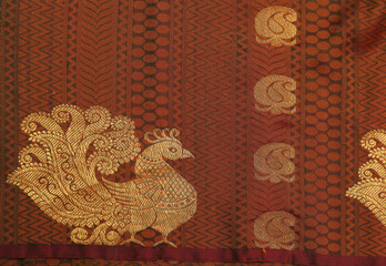 Indian made wedding red silk fabric with oeacock design