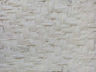 photo of white woven bamboo wall