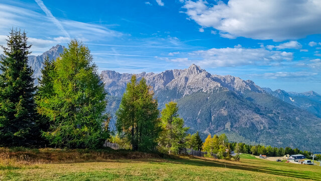 Alpine meadow on mount Helm (Monte Elmo) with scenic view of majestic mountains of untamed Sexten Dolomites, South Tyrol, Italy, Europe. Hiking concept Italian Alps. Looking from lift station Helmjet