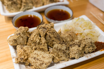 Deep fry stinky tofu on the dish