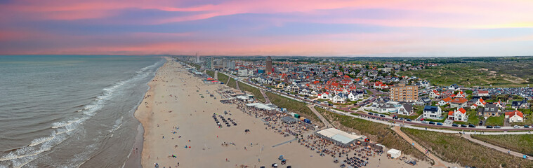 Aerial panorama from the beach at Zandvoort at the North Sea in the Netherlands at sunset - obrazy, fototapety, plakaty