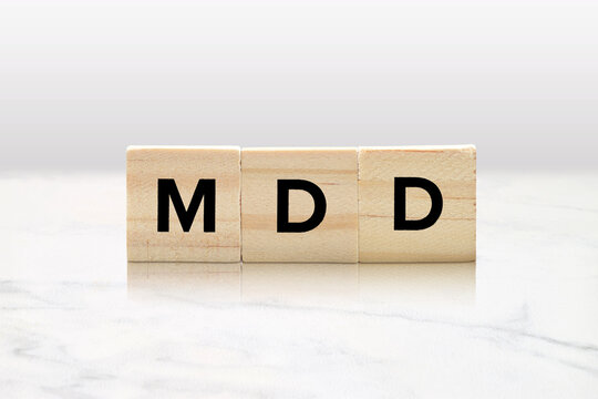 MDD Awareness Concept with Wood Tiles on White Background - Major Depressive Disorder - Depression - Mental Health