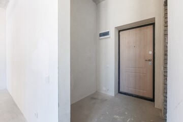 interior of the apartment without decoration in gray colors. rough finish