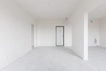 interior of the apartment without decoration in gray colors. rough finish