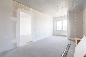 interior of the apartment without decoration in gray colors. rough finish