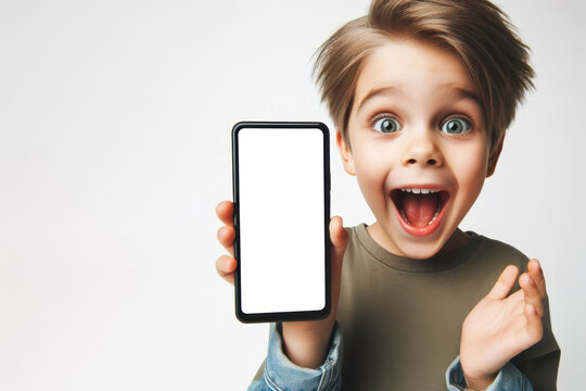 happy boy with Huge Eyes surprised expression hold smartphone with white mockup screen. ai generative