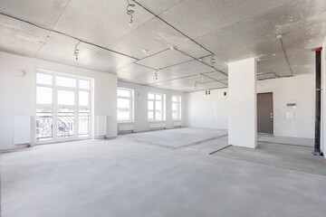 interior of the apartment without decoration in gray colors. rough finish