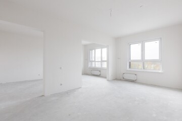 interior of the apartment without decoration in gray colors. rough finish