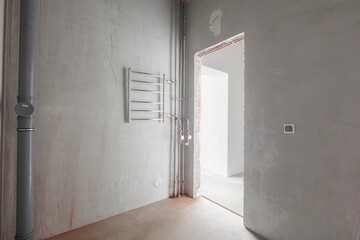 interior of the apartment without decoration in gray colors. rough finish