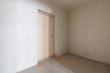 interior of the apartment without decoration in gray colors. rough finish