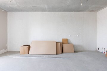 interior of the apartment without decoration in gray colors. rough finish