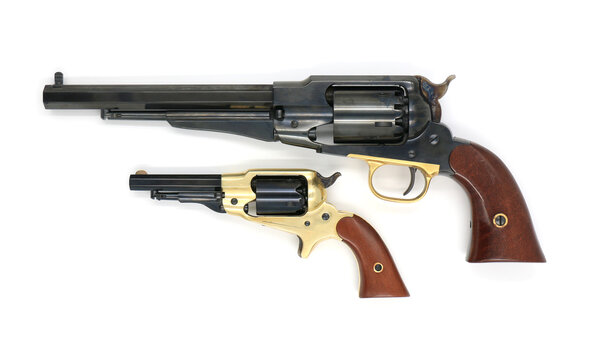 Remington 1858 New Army (cal.44) and Remington 1863 Pocket (cal.31) black powder percussion revolvers on a white background. Size comparison. Left side.