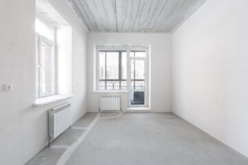 interior of the apartment without decoration in gray colors. rough finish