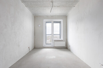 interior of the apartment without decoration in gray colors. rough finish