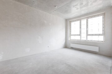 interior of the apartment without decoration in gray colors. rough finish