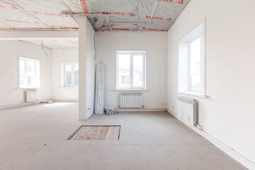 interior of the apartment without decoration in gray colors. rough finish