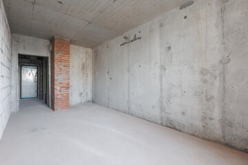 interior of the apartment without decoration in gray colors. rough finish