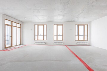 interior of the apartment without decoration in gray colors. rough finish