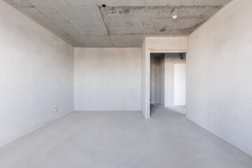 interior of the apartment without decoration in gray colors. rough finish
