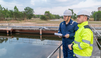 Environmental engineers work at wastewater treatment plants,Water supply engineering working at...