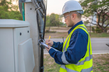 Telecommunication engineers work at cell towers for 5G cell phone signals,Network tower maintenance...