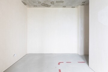 interior of the apartment without decoration in gray colors. rough finish