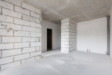 interior of the apartment without decoration in gray colors. rough finish