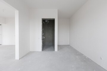 interior of the apartment without decoration in gray colors. rough finish