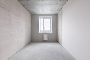interior of the apartment without decoration in gray colors. rough finish