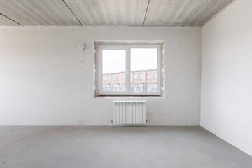 interior of the apartment without decoration in gray colors. rough finish