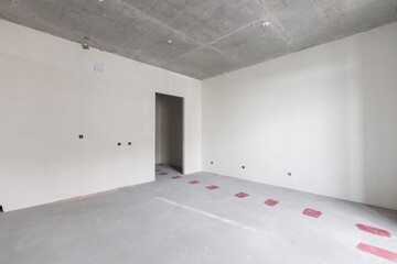 interior of the apartment without decoration in gray colors. rough finish