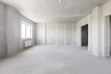 interior of the apartment without decoration in gray colors. rough finish