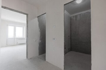 interior of the apartment without decoration in gray colors. rough finish