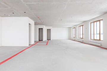 interior of the apartment without decoration in gray colors. rough finish