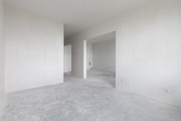 interior of the apartment without decoration in gray colors. rough finish