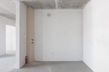 interior of the apartment without decoration in gray colors. rough finish