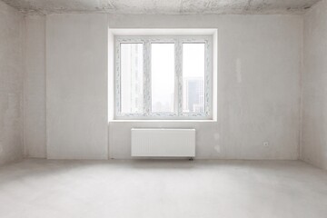 interior of the apartment without decoration in gray colors. rough finish